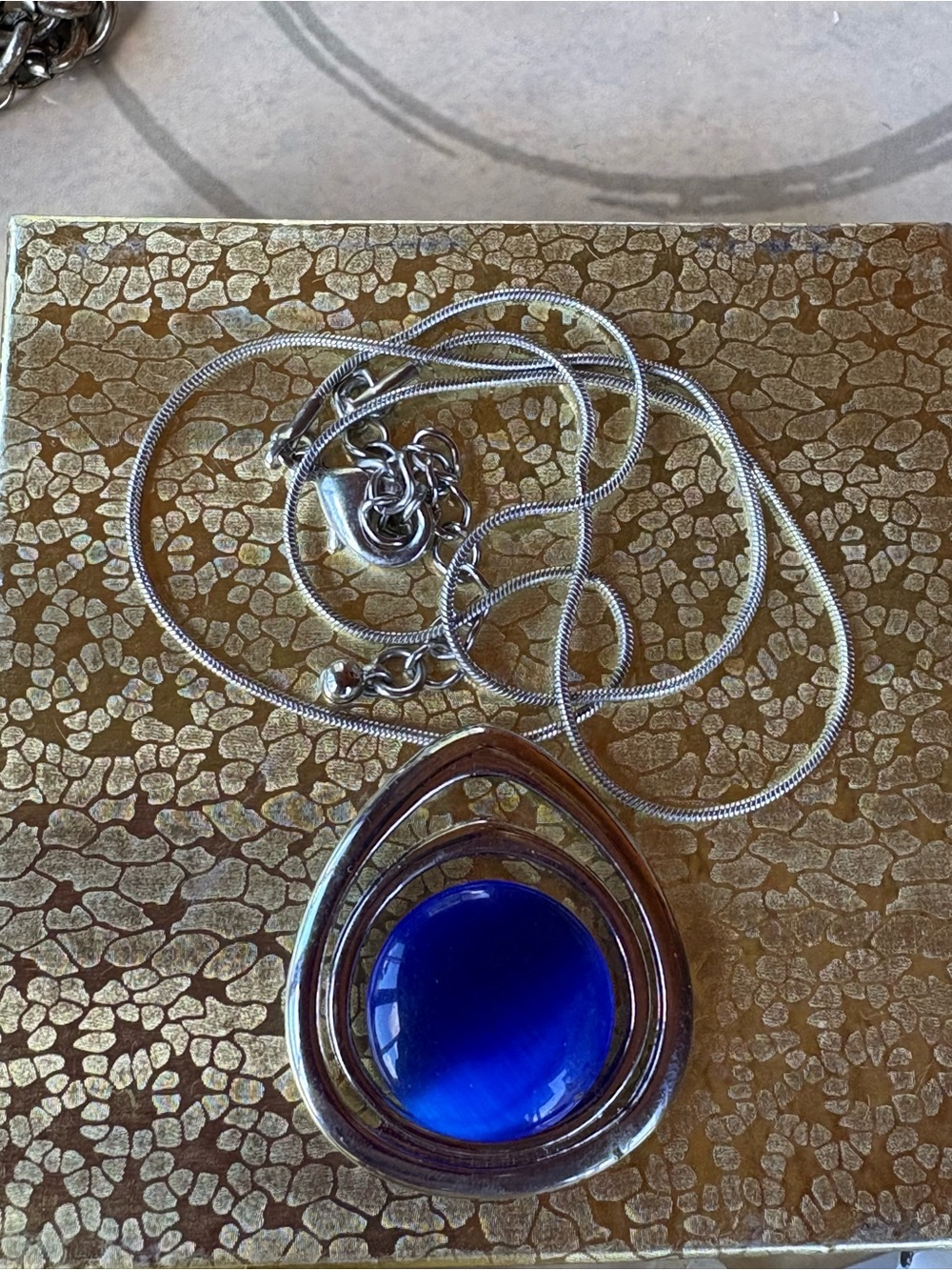 CJ Banks Silver Teardrop Necklace with Deep Blue Cabochon